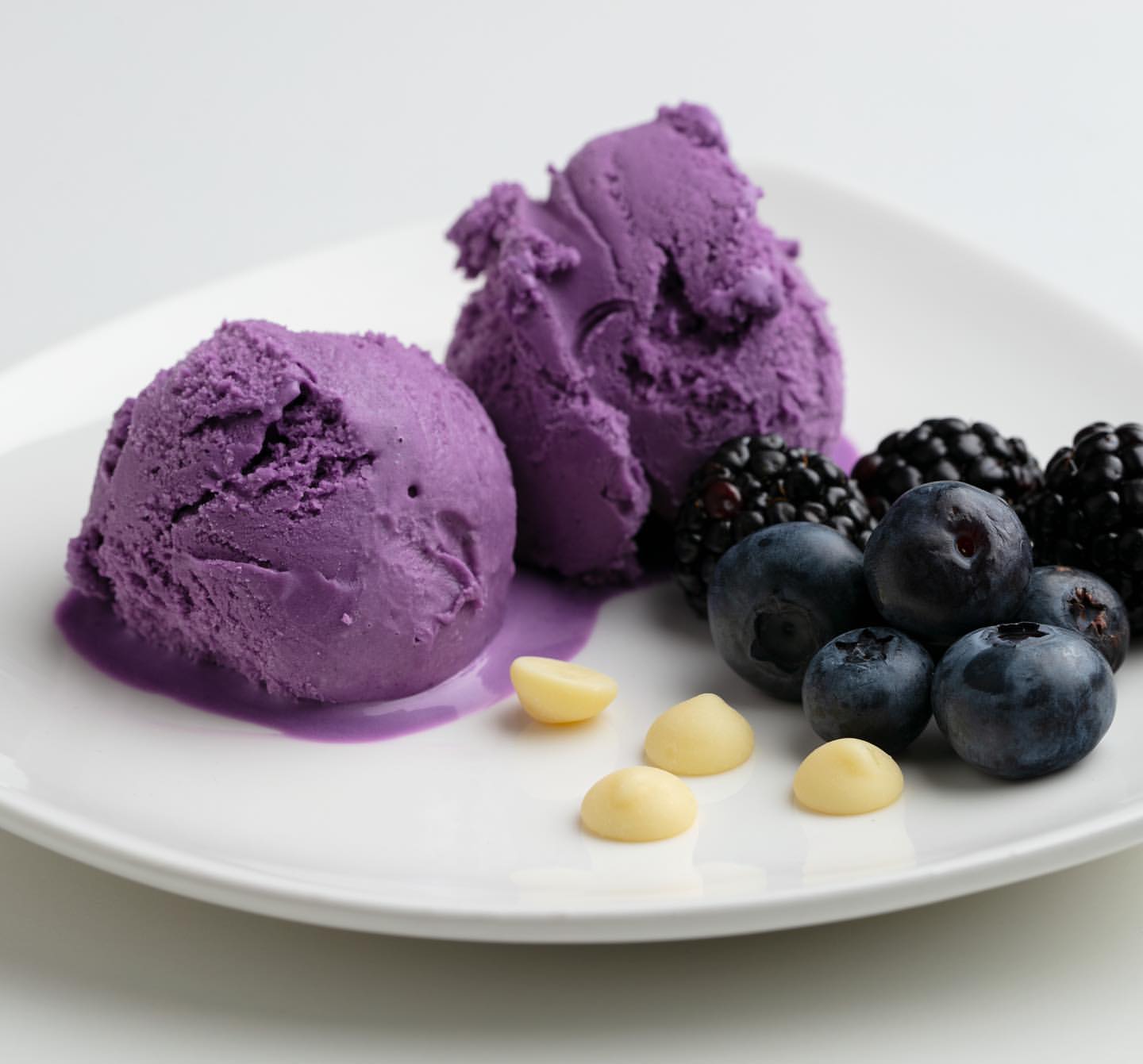 Ube Ice Cream with blackberries, blueberries, and white chocolate